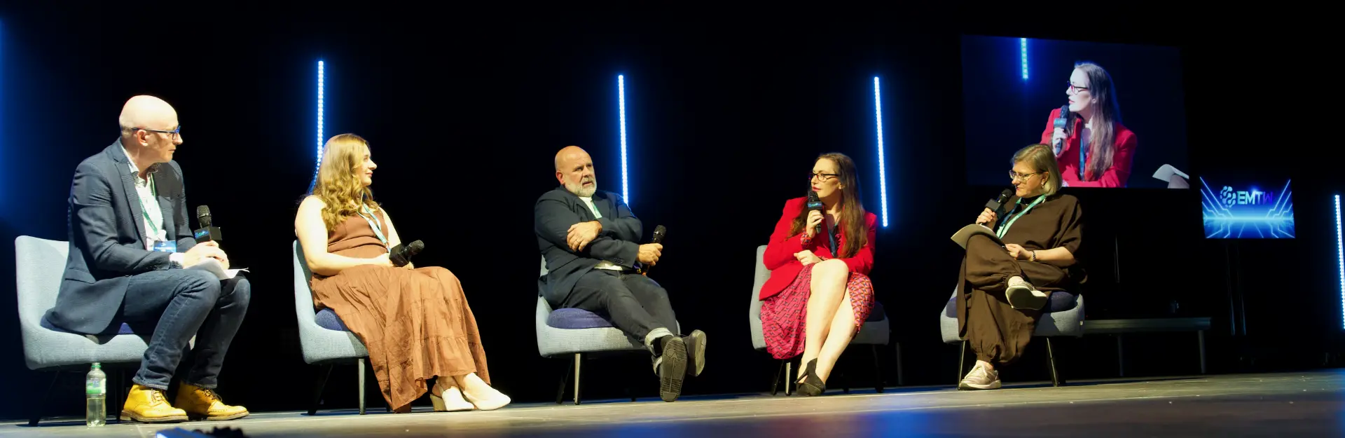 Stephanie Stasey speaking on a conference panel at EMTW